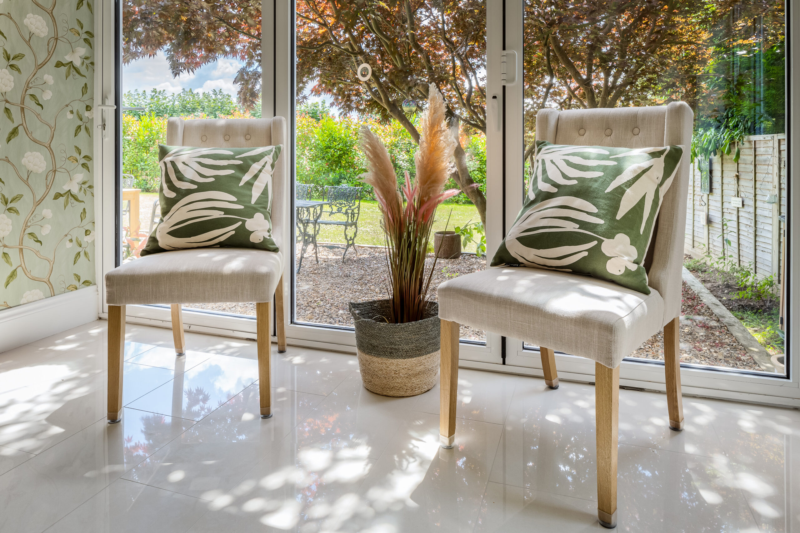 seating area, natural light, bifold doors, views onto nature, relaxing areas, views onto garden, biophilic design, biophilic interiors, styling properties, renovations, home staging, country style interiors
